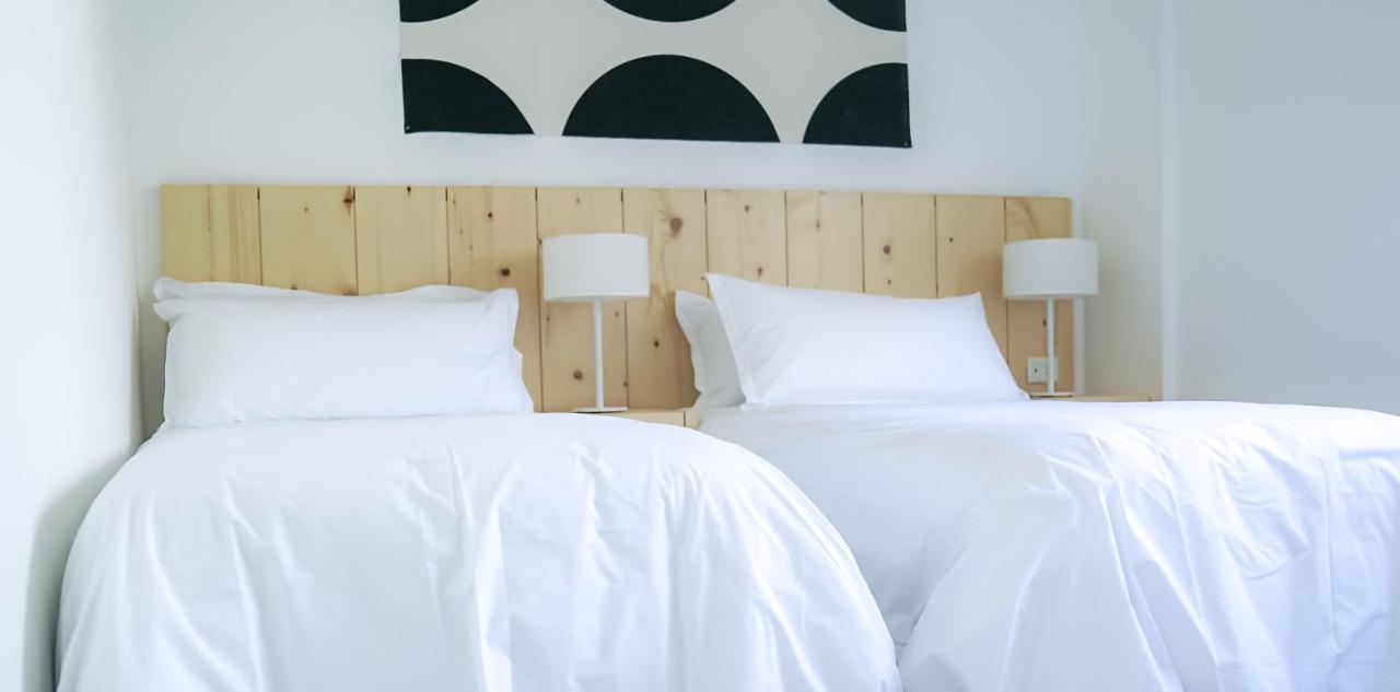 Casagrande Hotel & Beach Club José Ignacio Zewnętrze zdjęcie A bed with white sheets